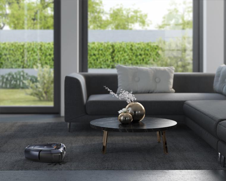 El robot aspirador RX en el sal&oacute;n de un hogar